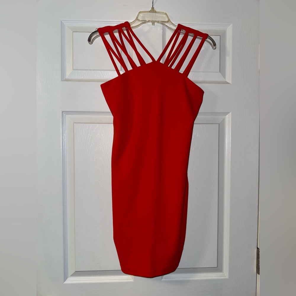 red dress. strappy shoulders. size medium.